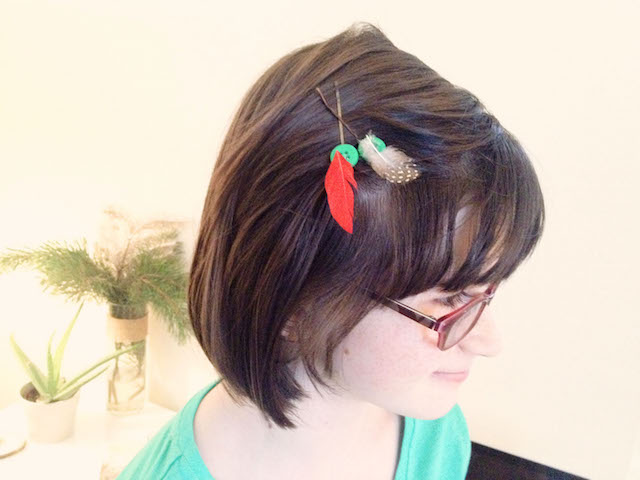 Girl with feather hair ornament