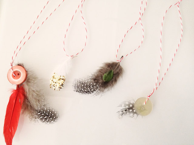 feather ornaments on string